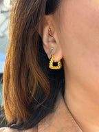 Golden twisted hoop earrings