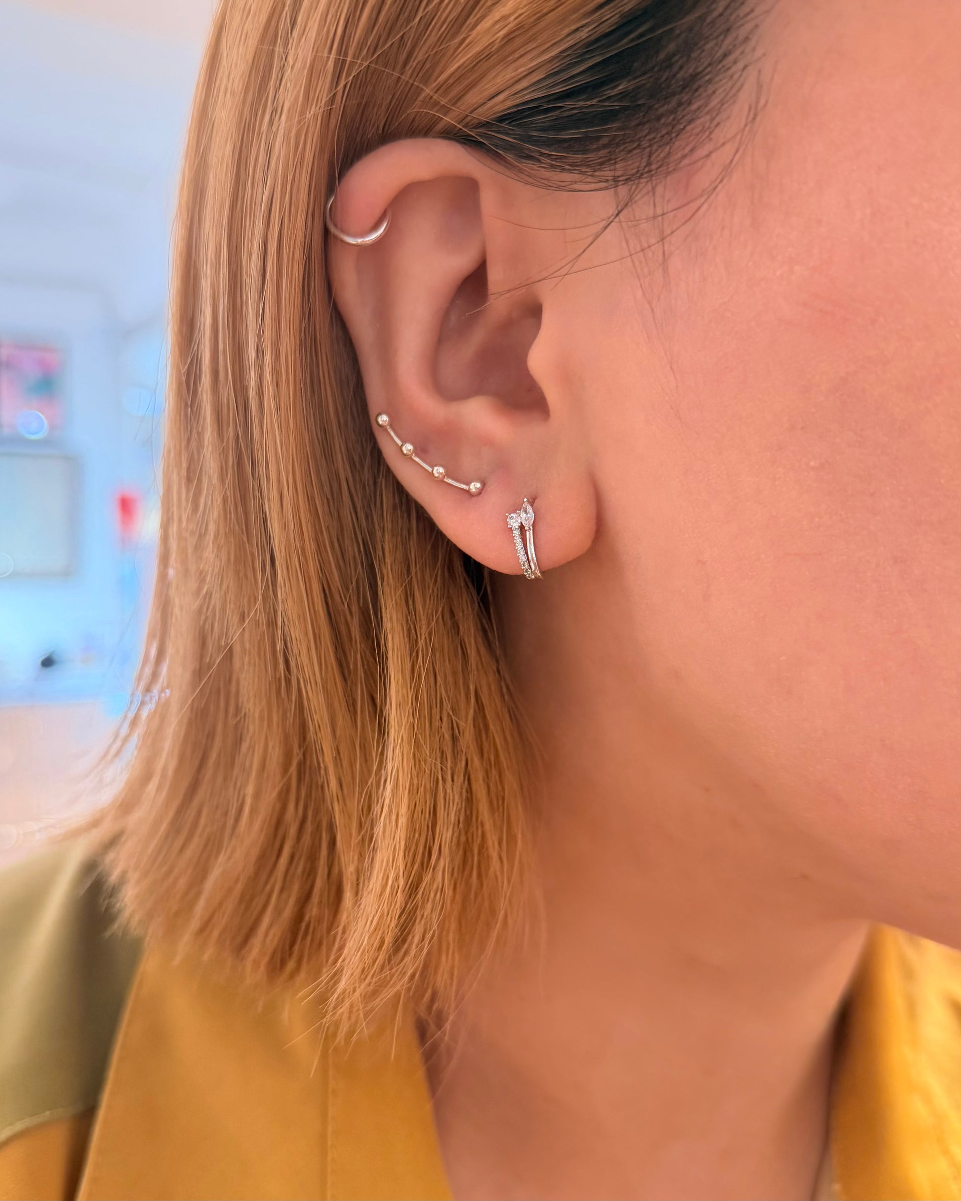 Cz curved U-shaped stud piercing