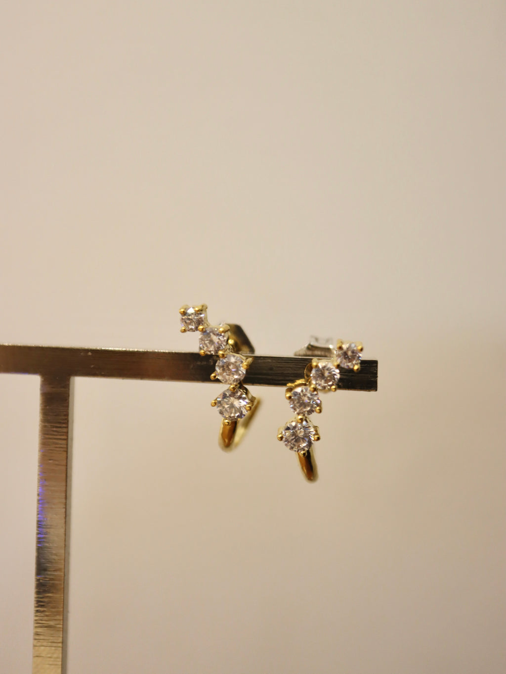 Curved cz brass earrings