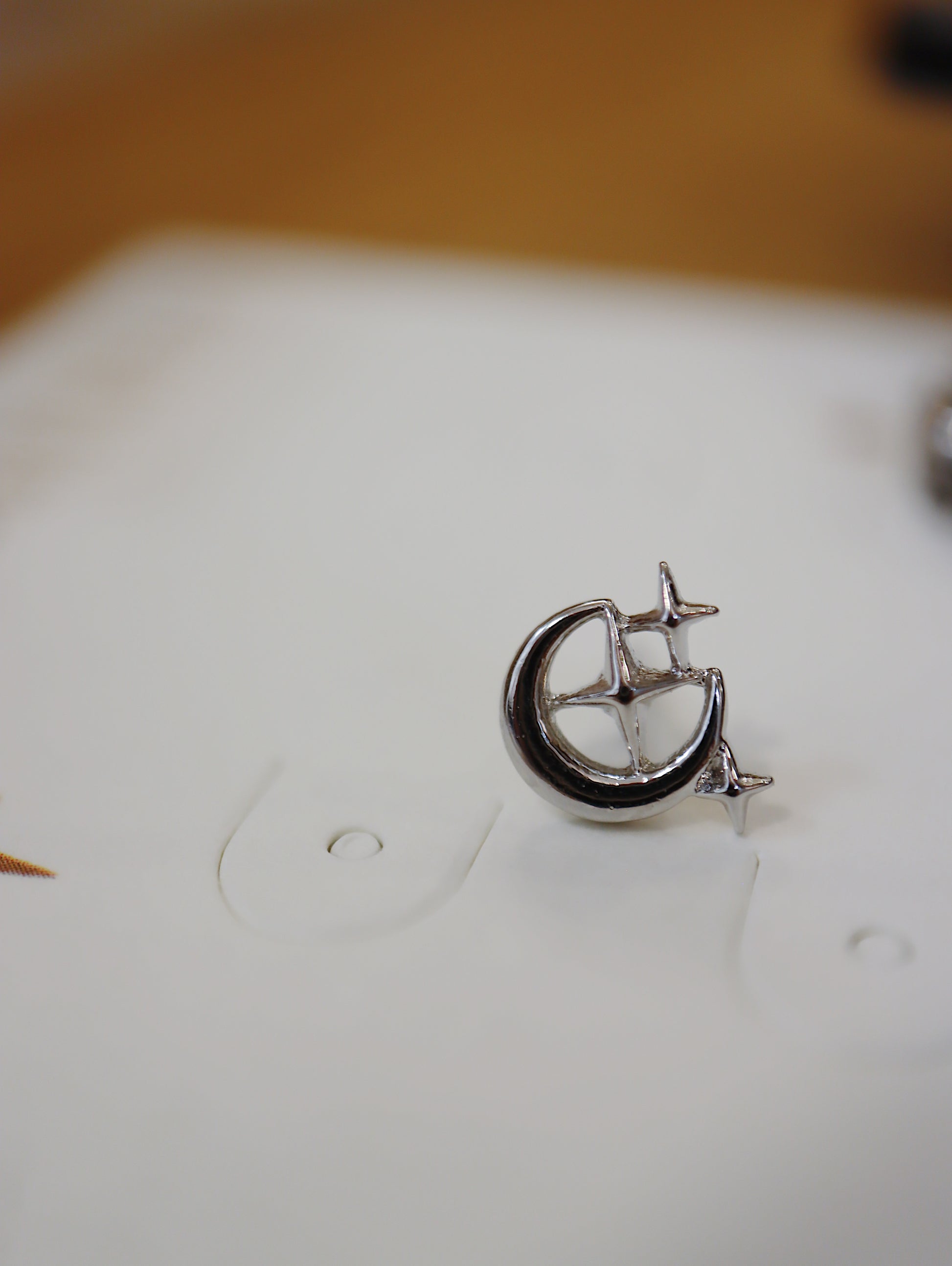Starlit crescent surgical steel stud piercing