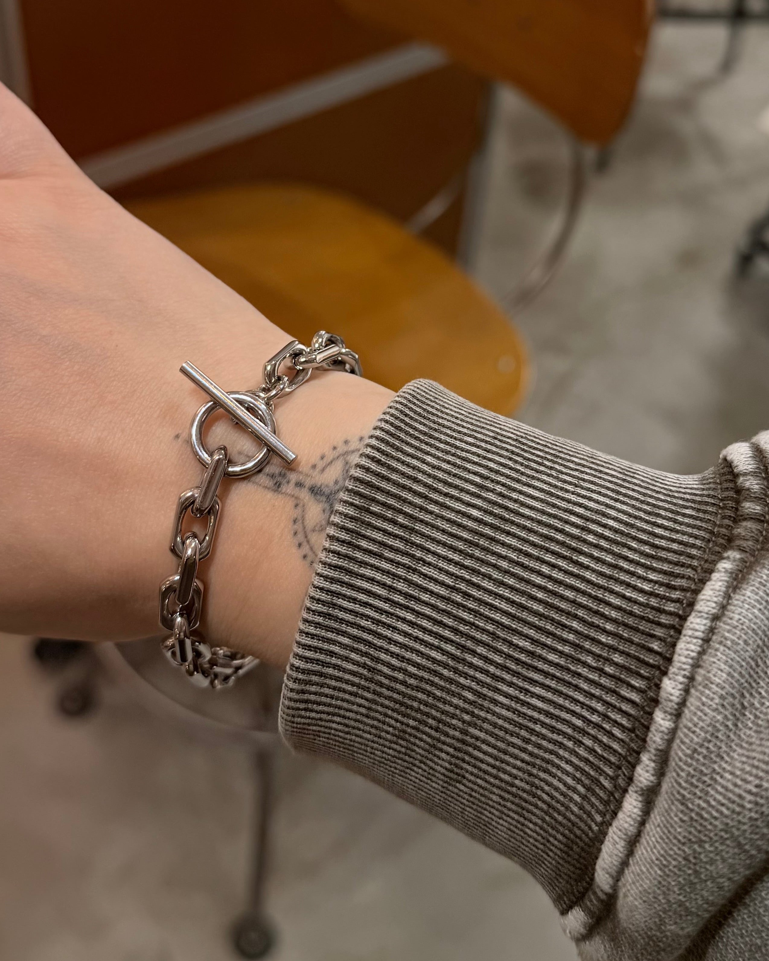 Interlock front lock stainless steel bracelet