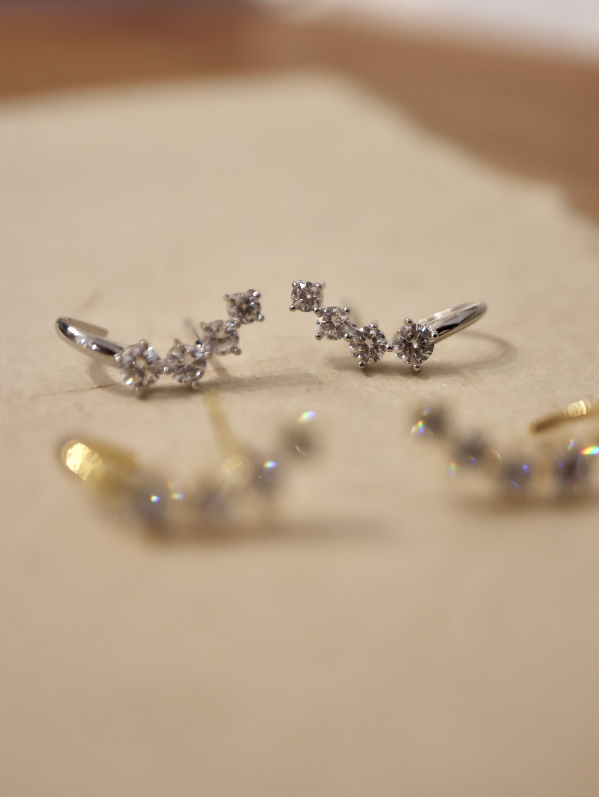 Curved cz brass earrings