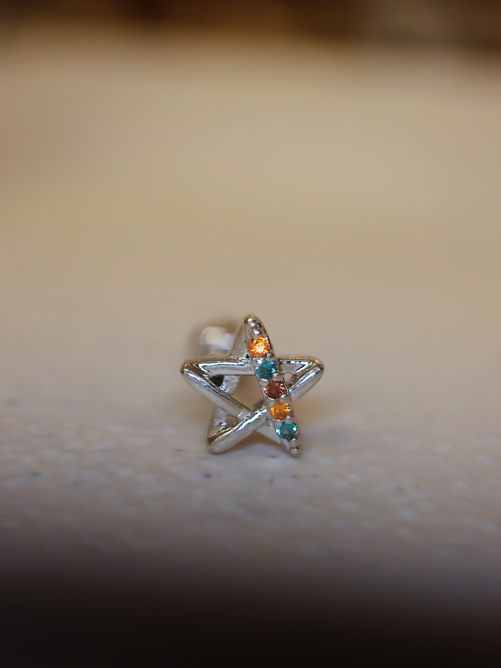 Rainbow star surgical steel stud piercing