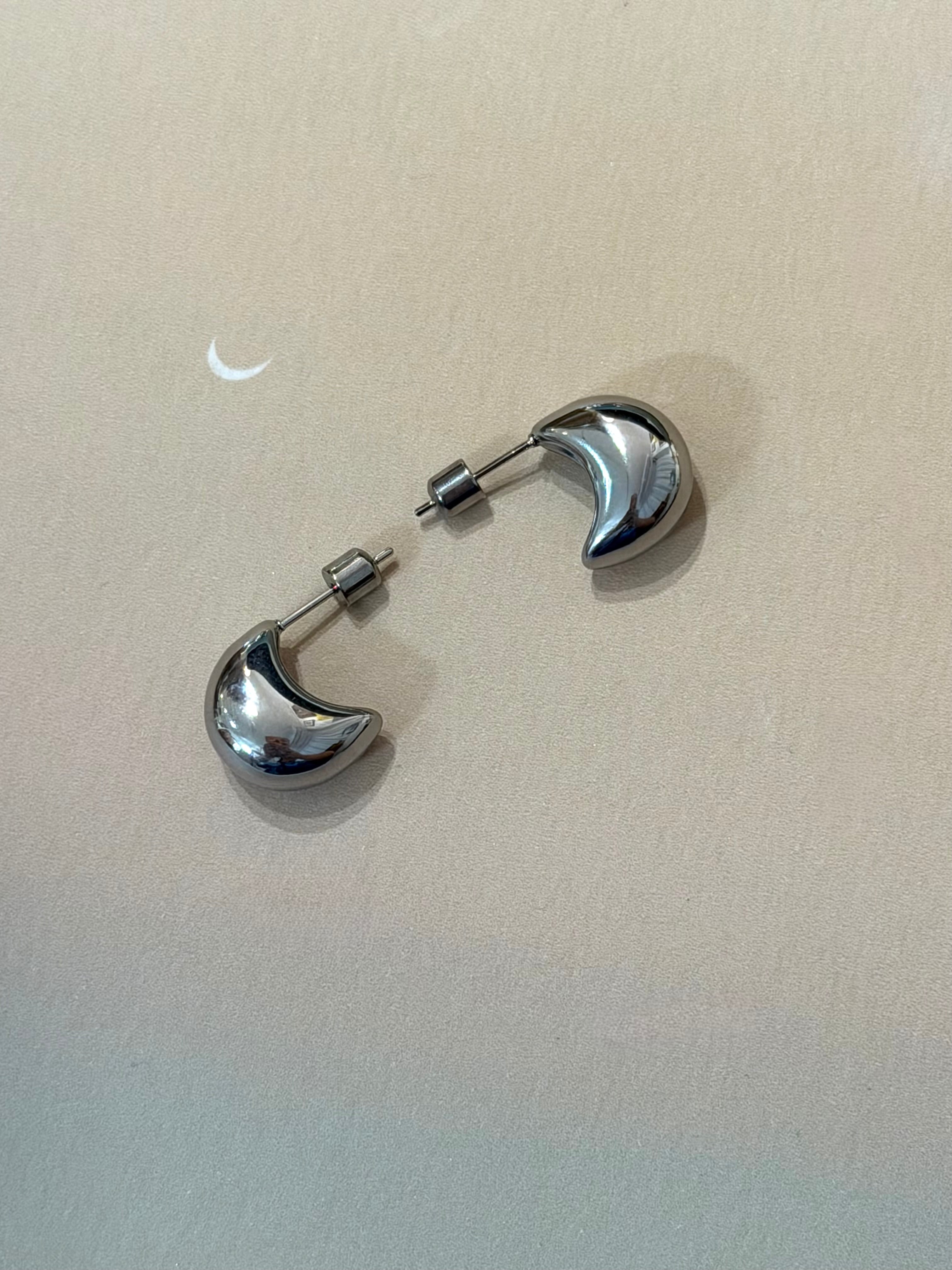 Crescent glow stainless steel earrings