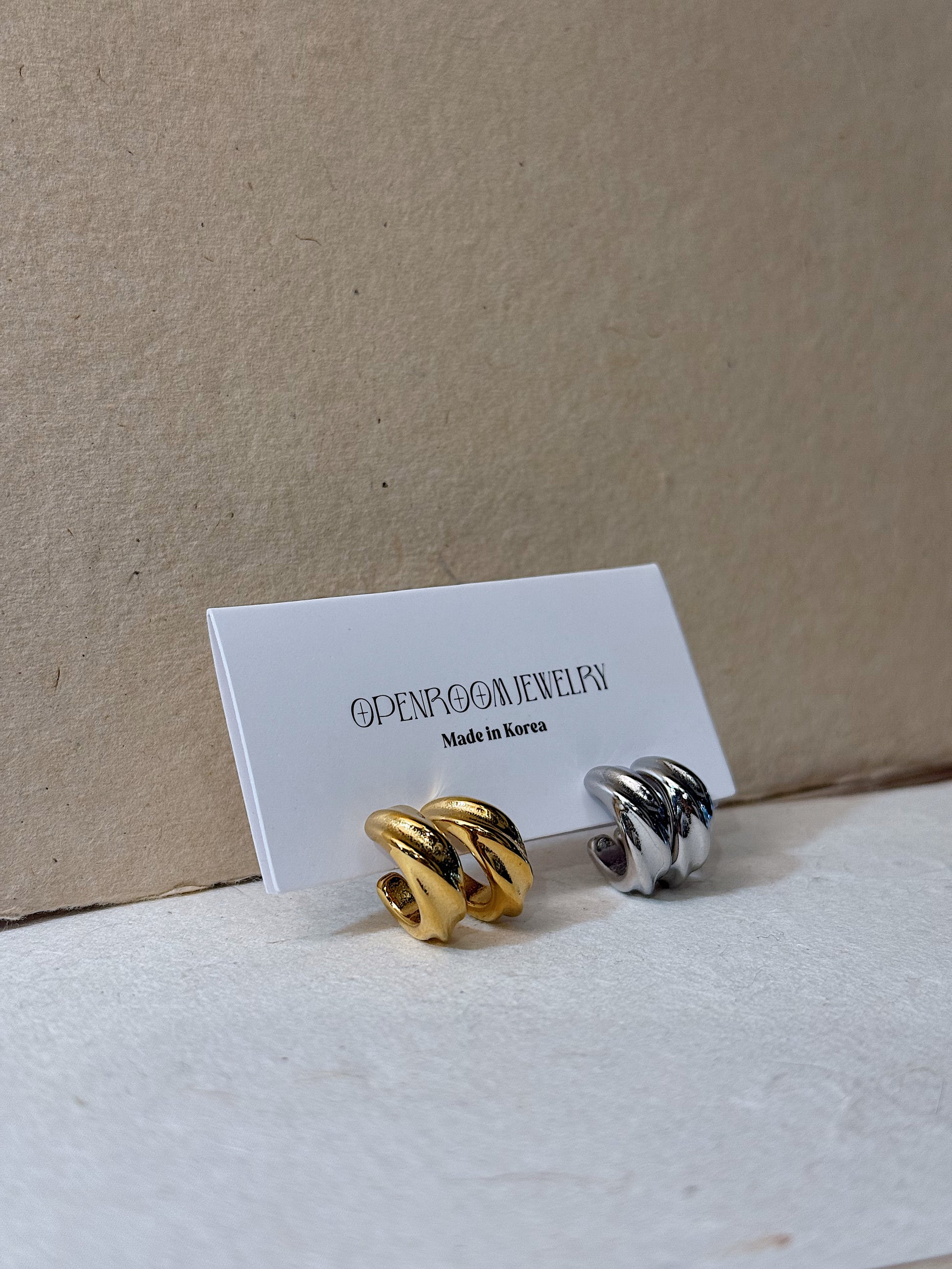 Twisted hoop stainless steel earrings