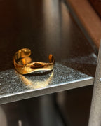 Bold wavy stainless steel bangle
