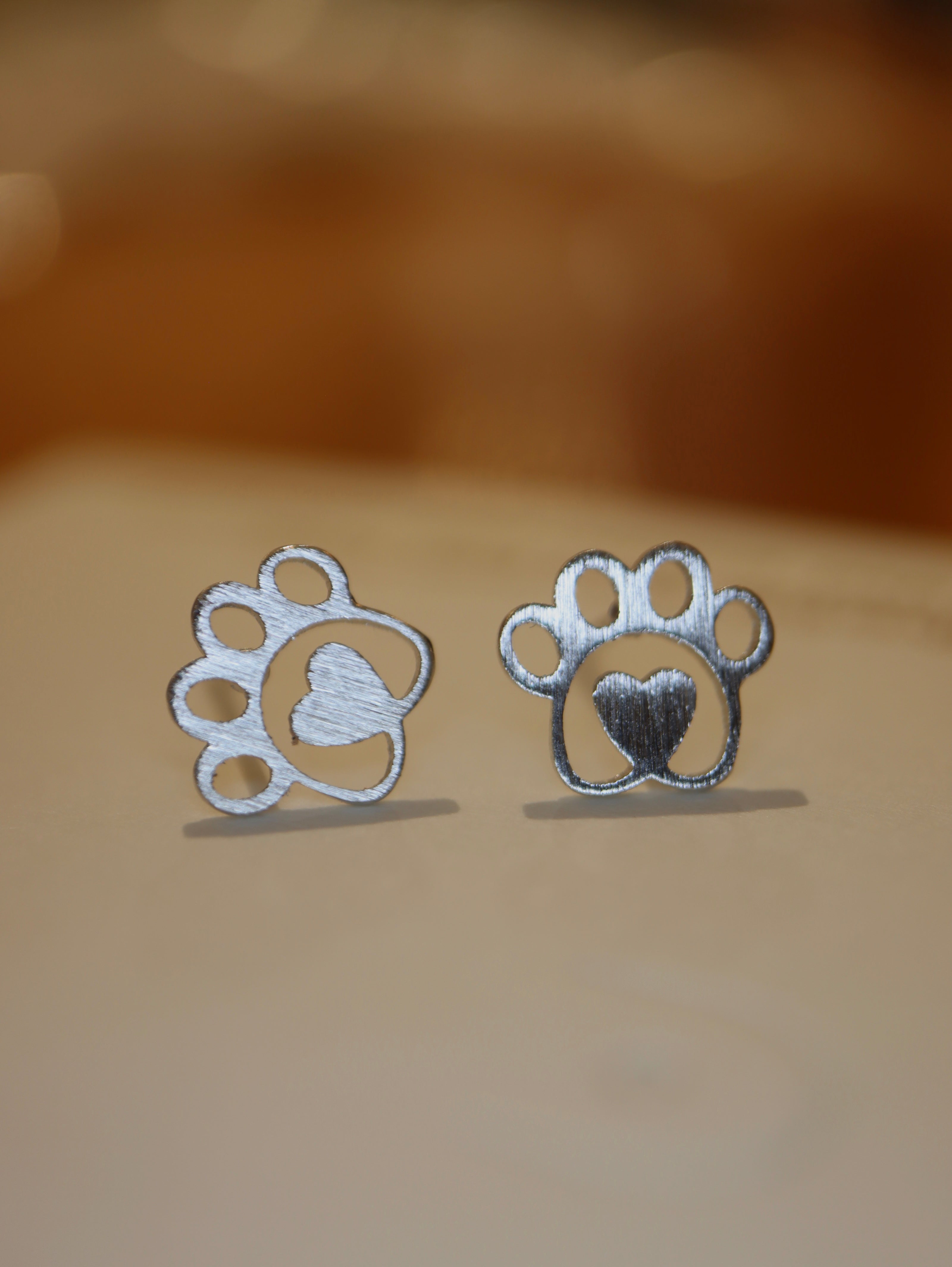 Heart center paws earrings