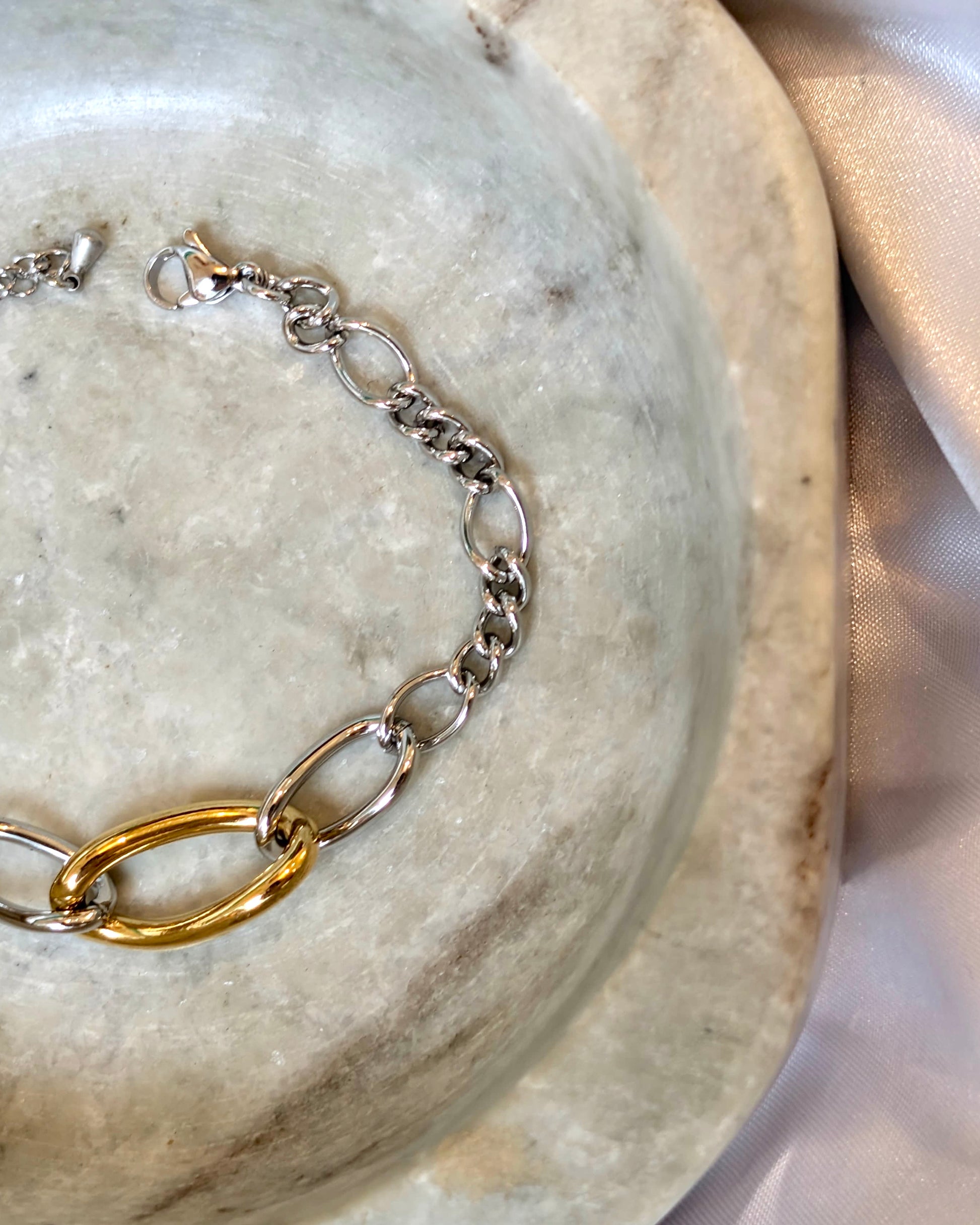 Mix tone interlock stainless steel bracelet