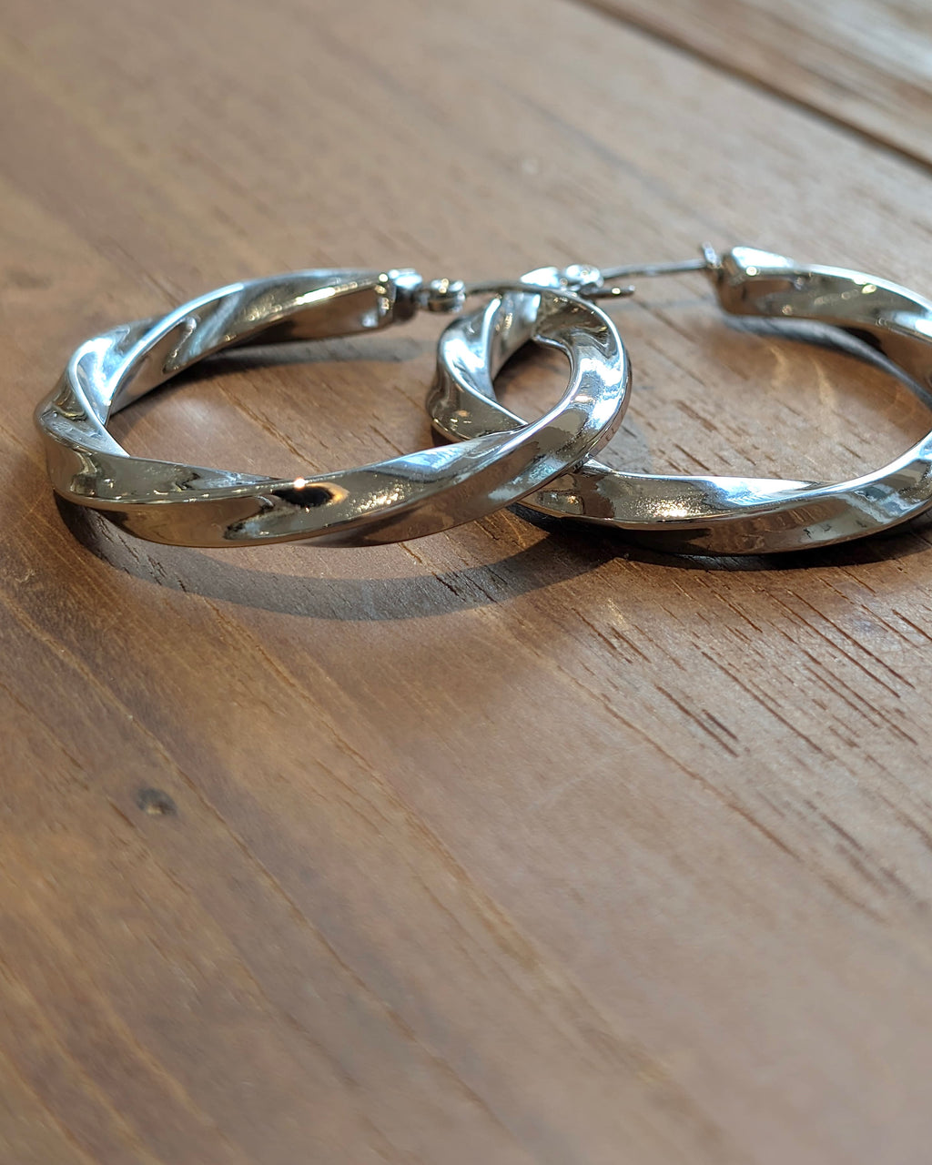 Twisted statement hoop earrings
