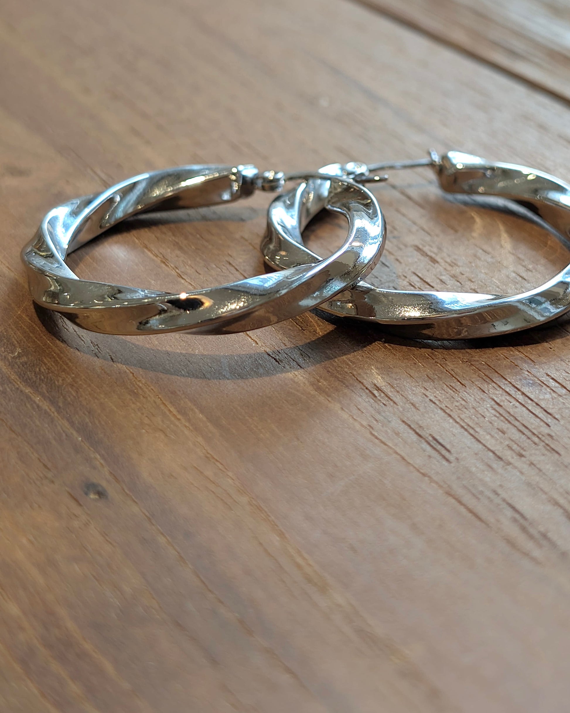 Twisted statement hoop earrings