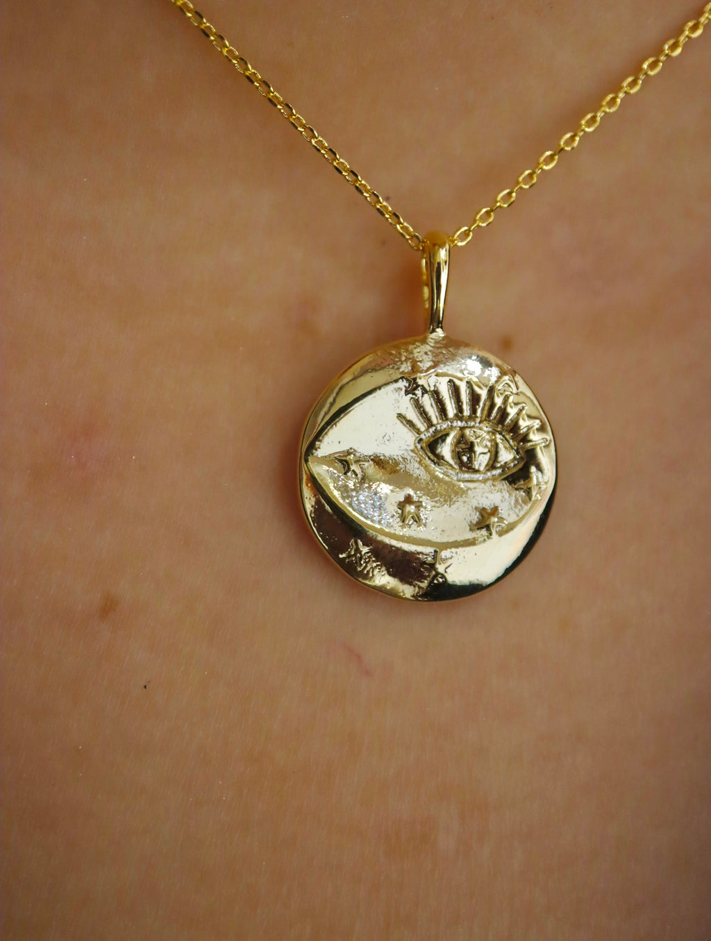 Eye coin brass necklace