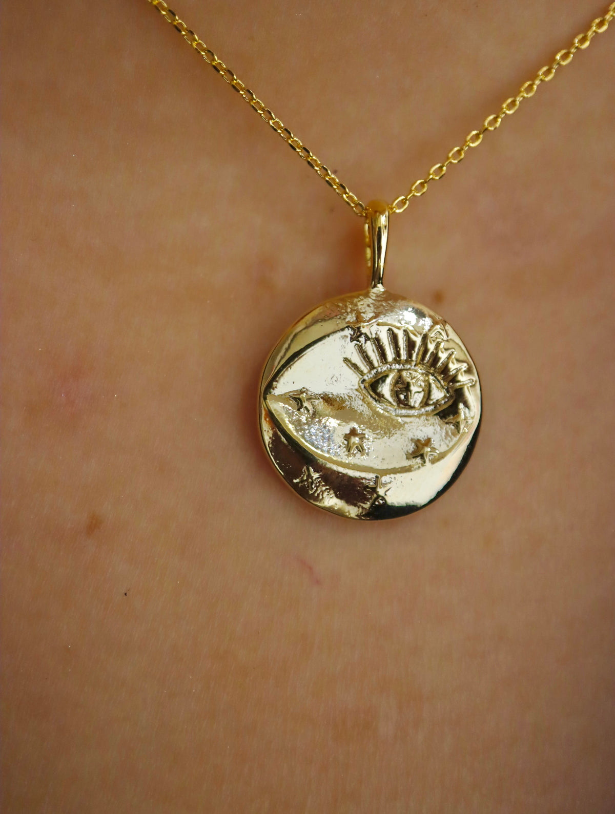 Eye coin brass necklace