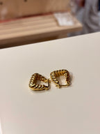 Golden twisted hoop earrings