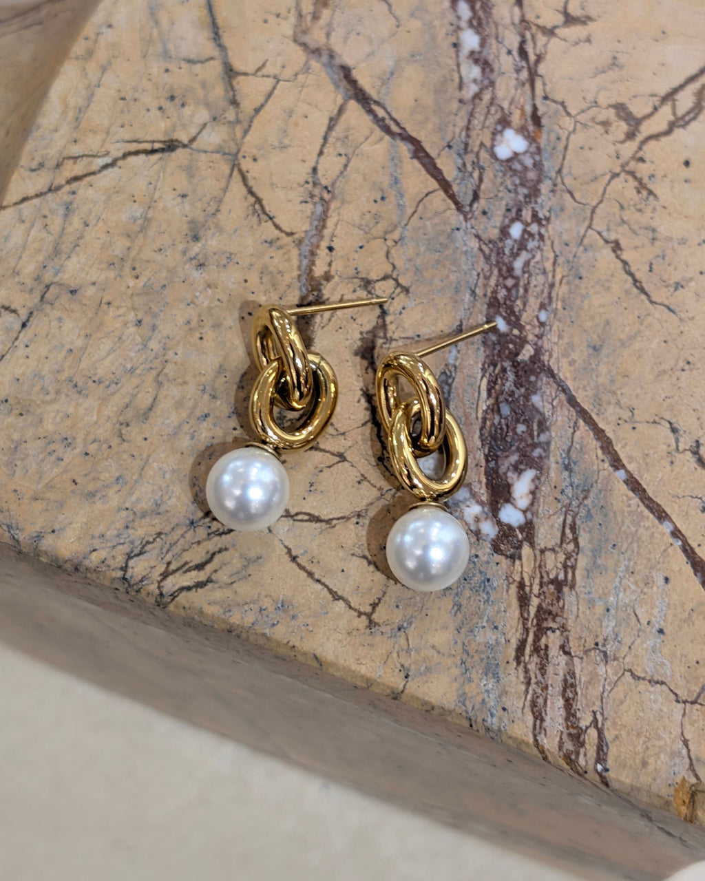 Stainless steel interlock earrings