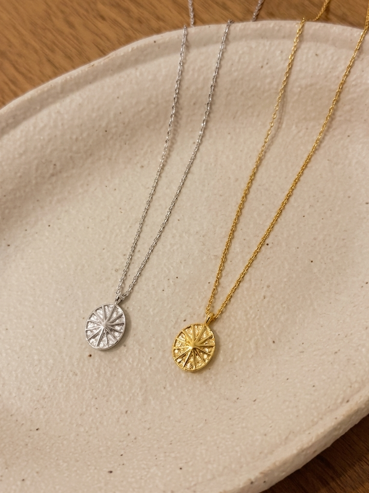 Oval sun ray brass necklace