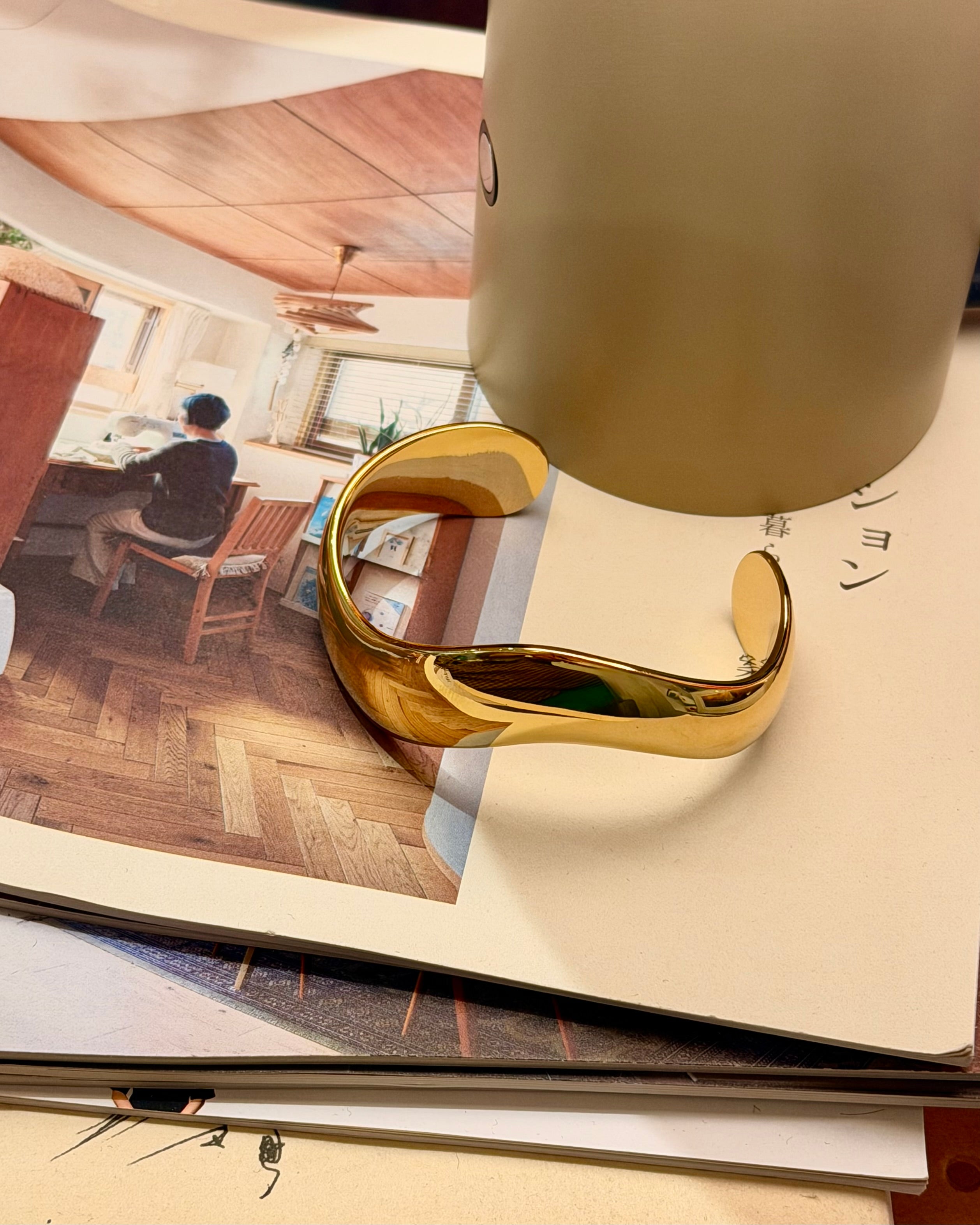 Bold wavy stainless steel bangle