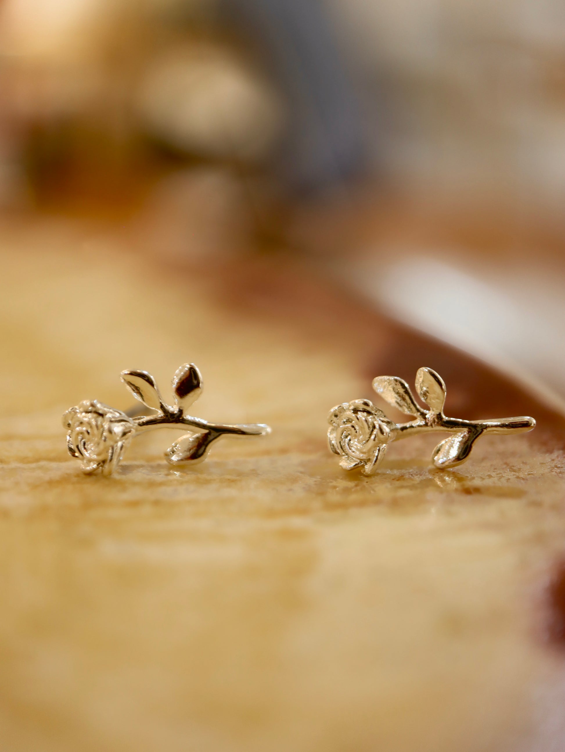 Rose silver tone earrings