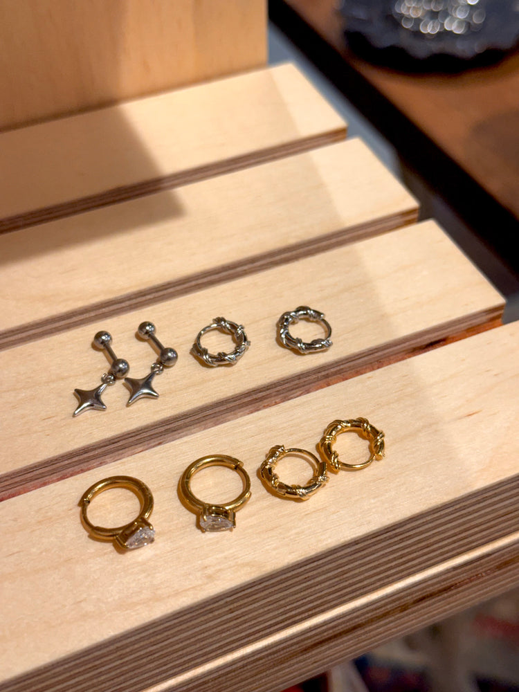 Hinged hoop rope earrings