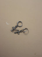 Hinged hoop drop cross earrings