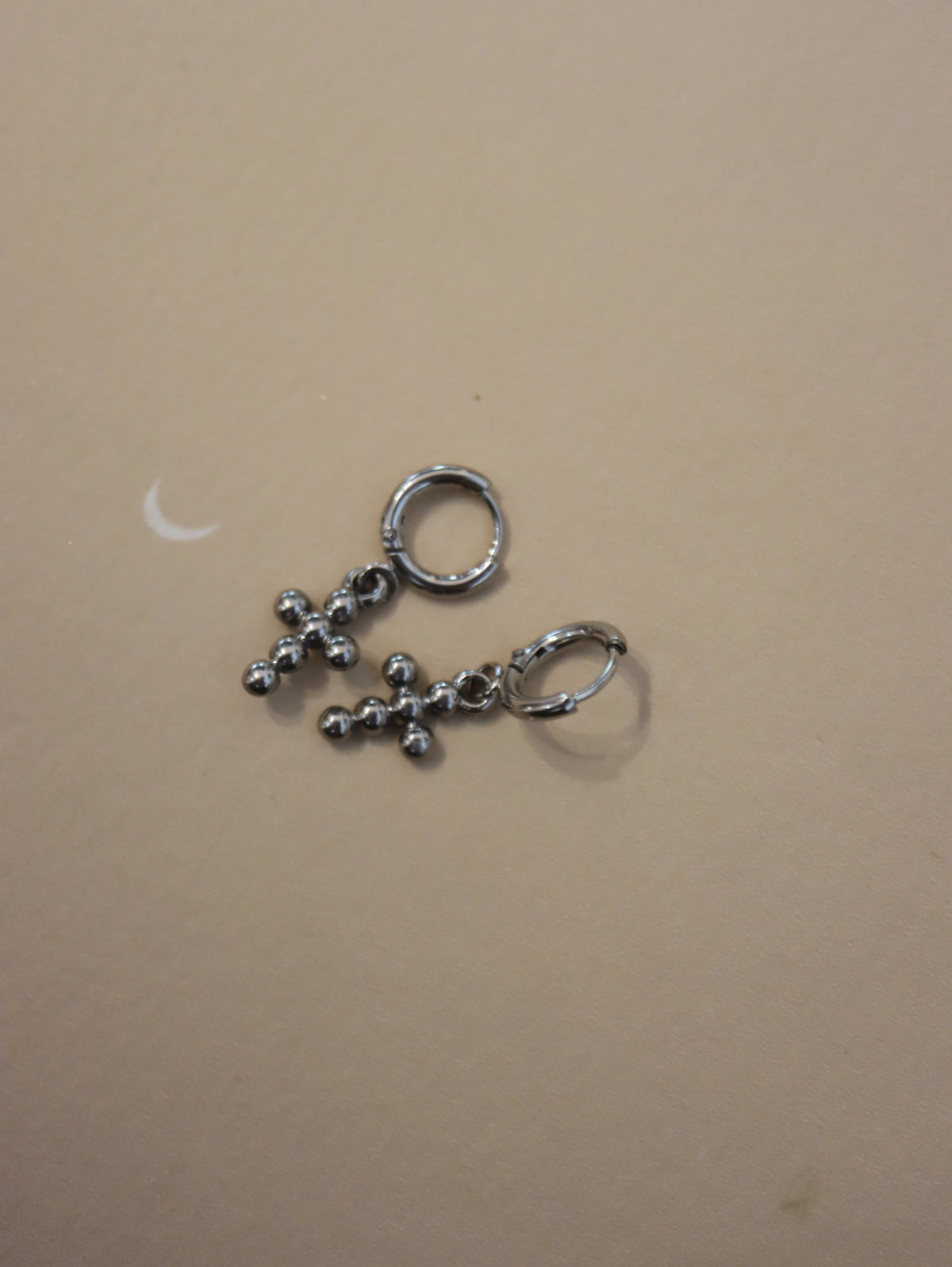 Hinged hoop drop cross earrings