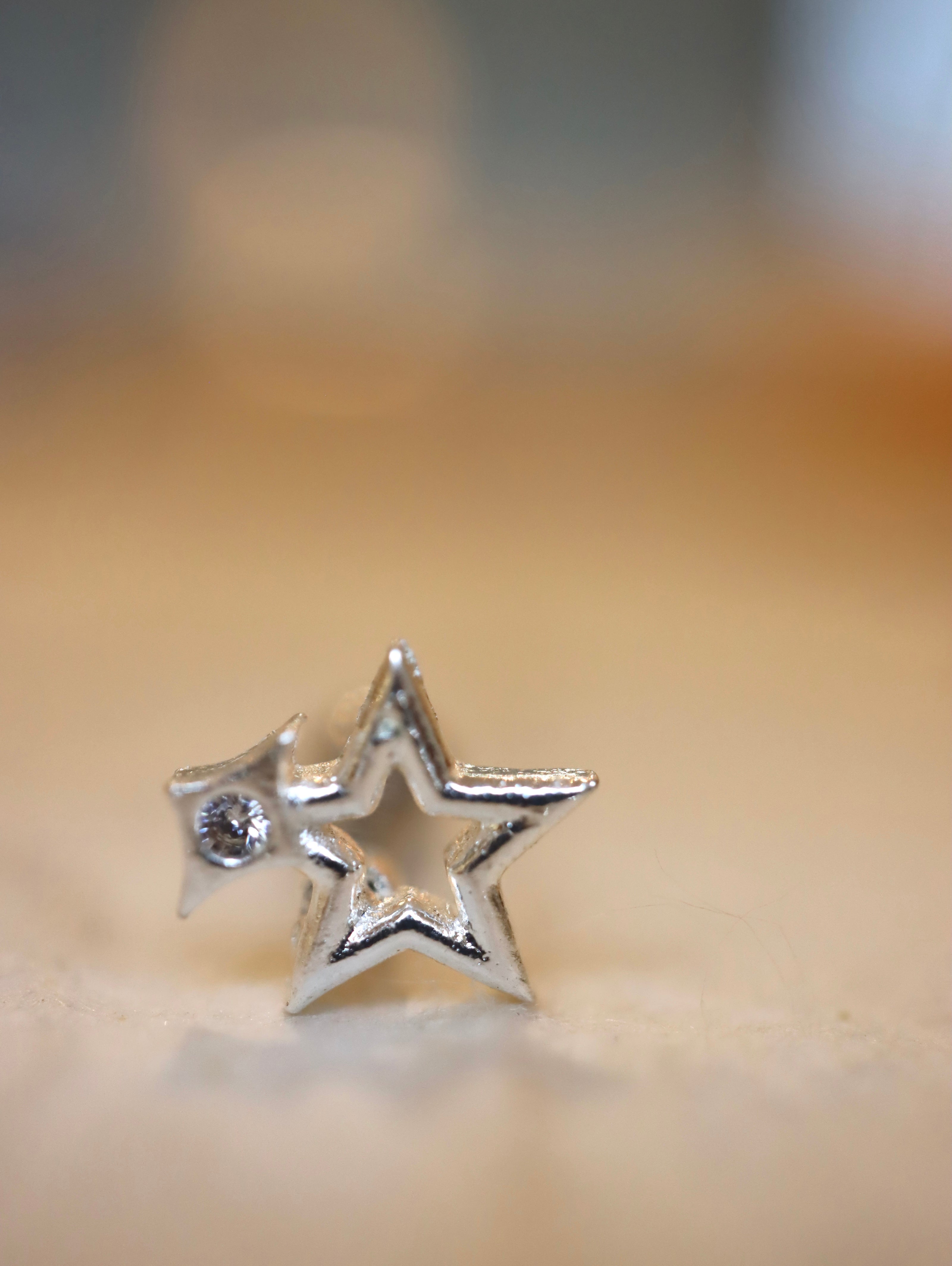 Star sparkle stud surgical steel earring