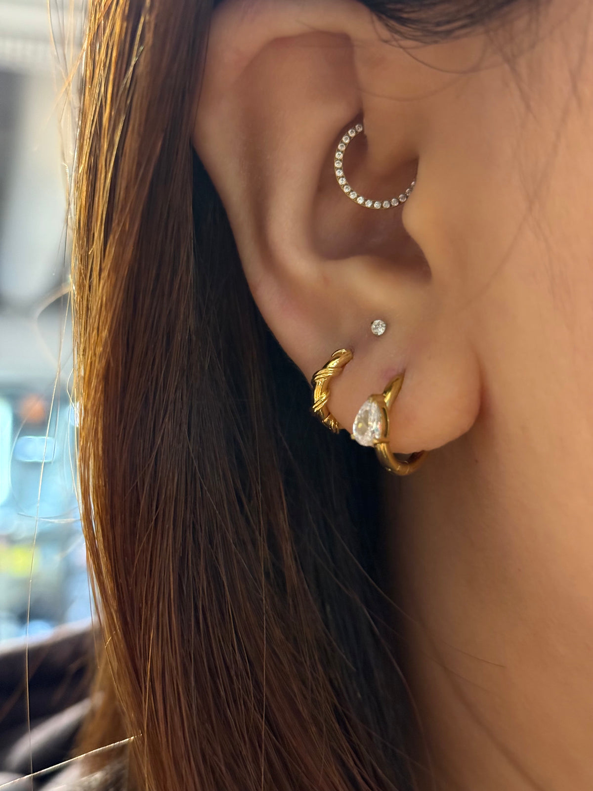 Hinged hoop rope earrings