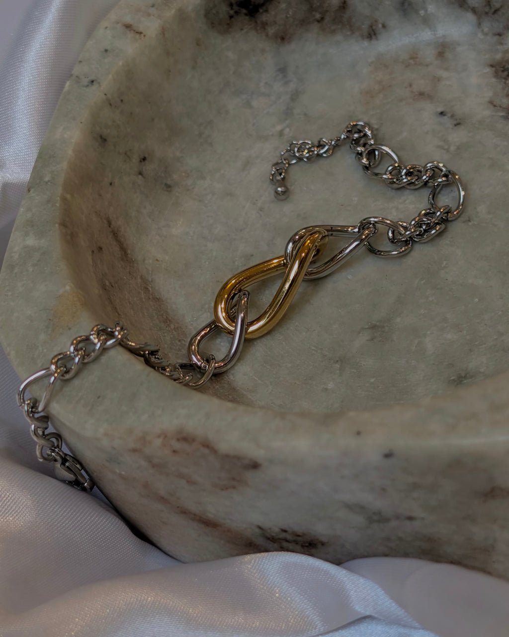 Mix tone interlock stainless steel bracelet