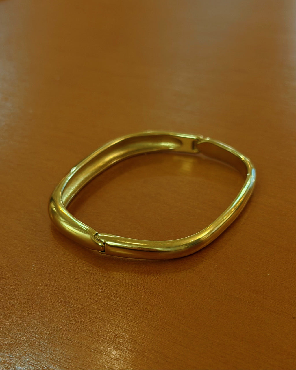 Stainless steel water resistant  lock bangle in gold