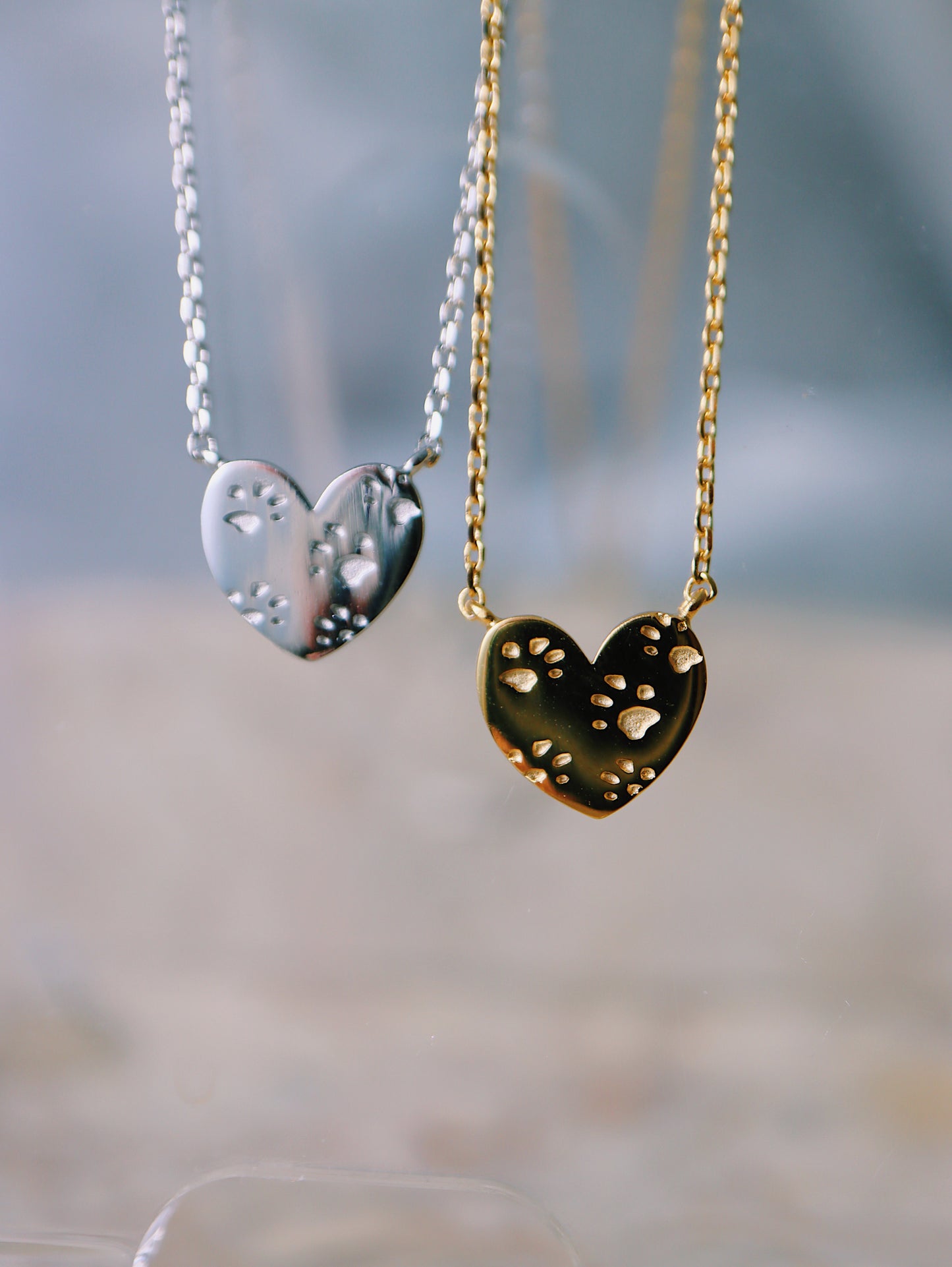 Paws on heart brass necklace