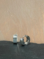 Surgical steel flat hinged hoop earrings