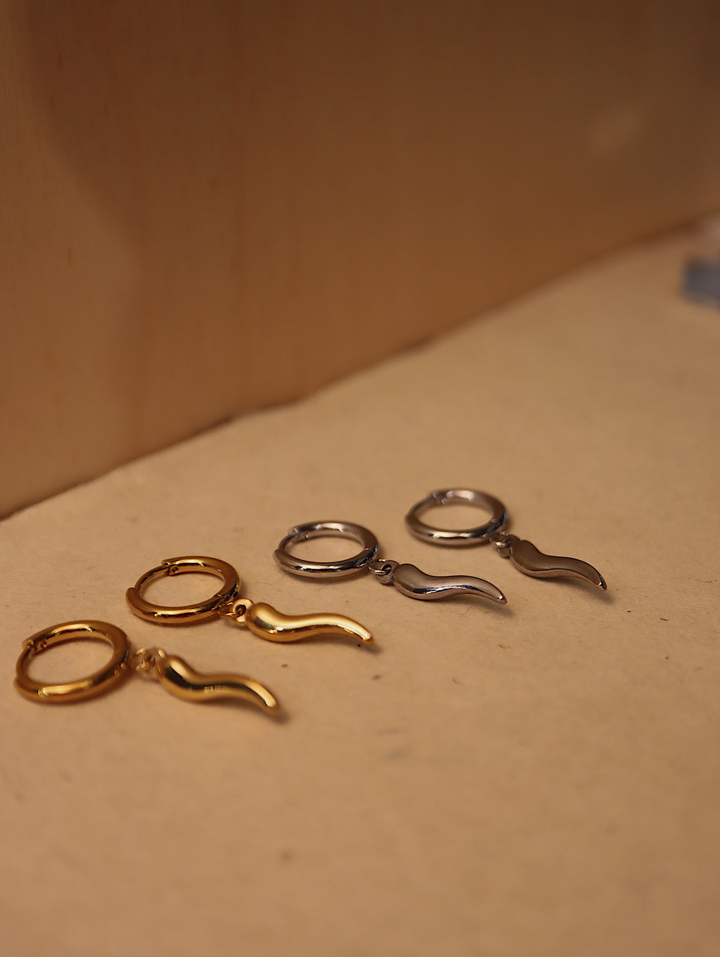 Stainless steel horn hoop earrings