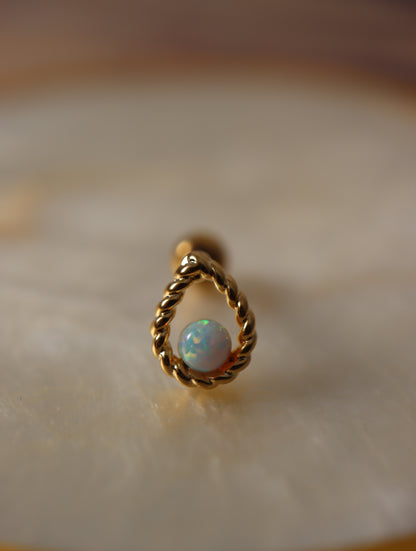 Teardrop opal screw ball piercing