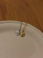 Oval sun ray brass necklace