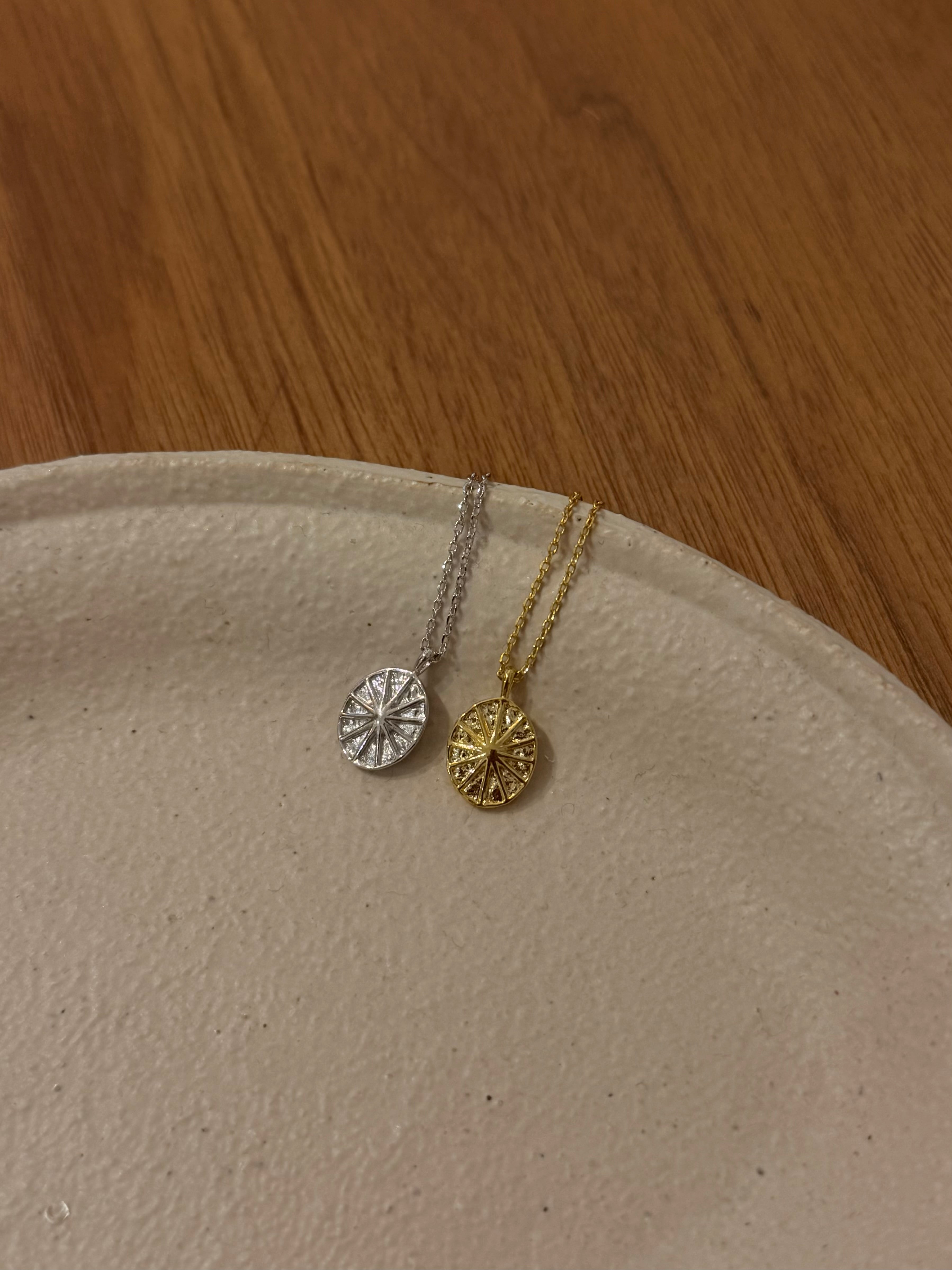 Oval sun ray brass necklace