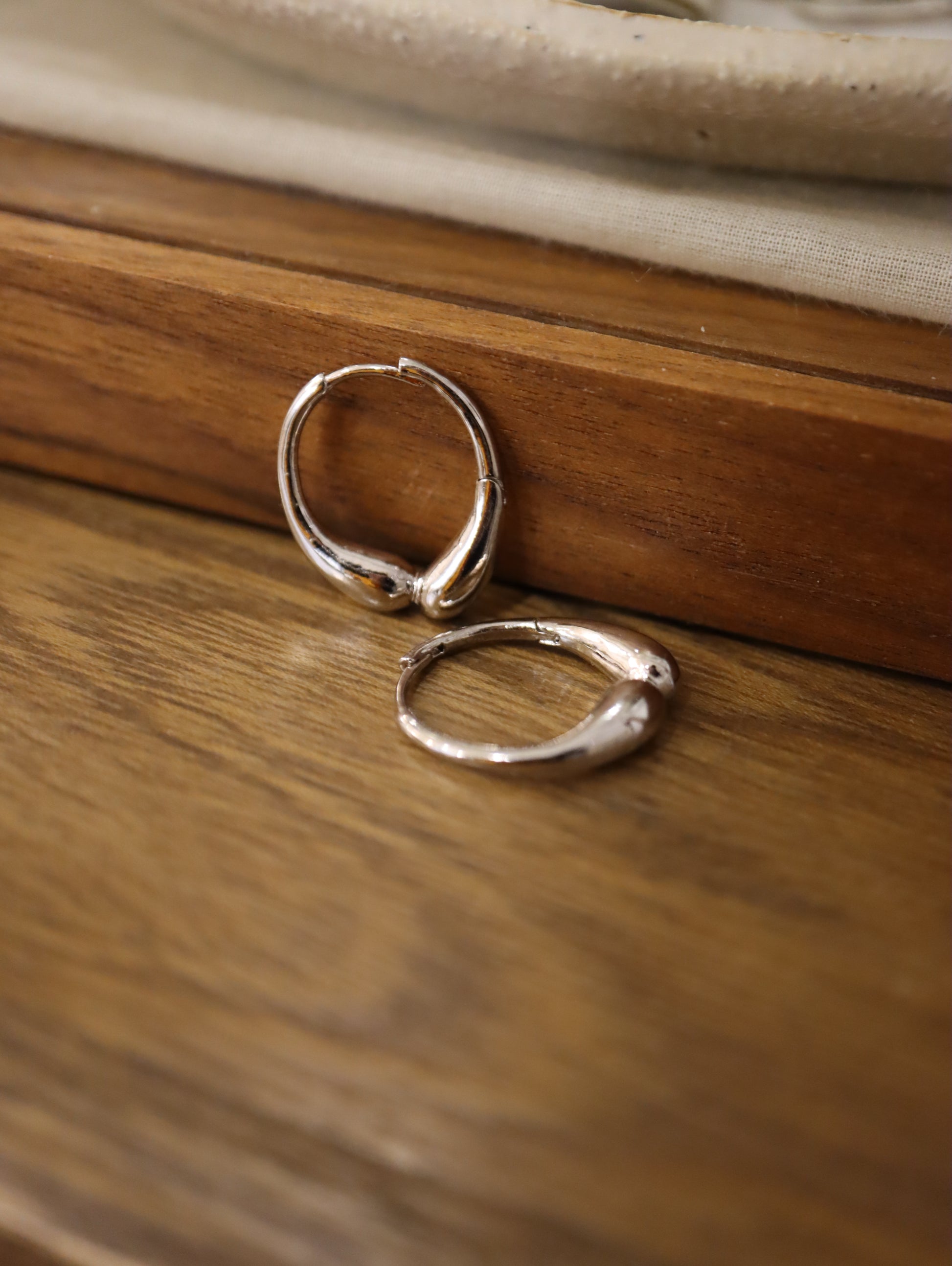 Hinged hoop base metal earrings