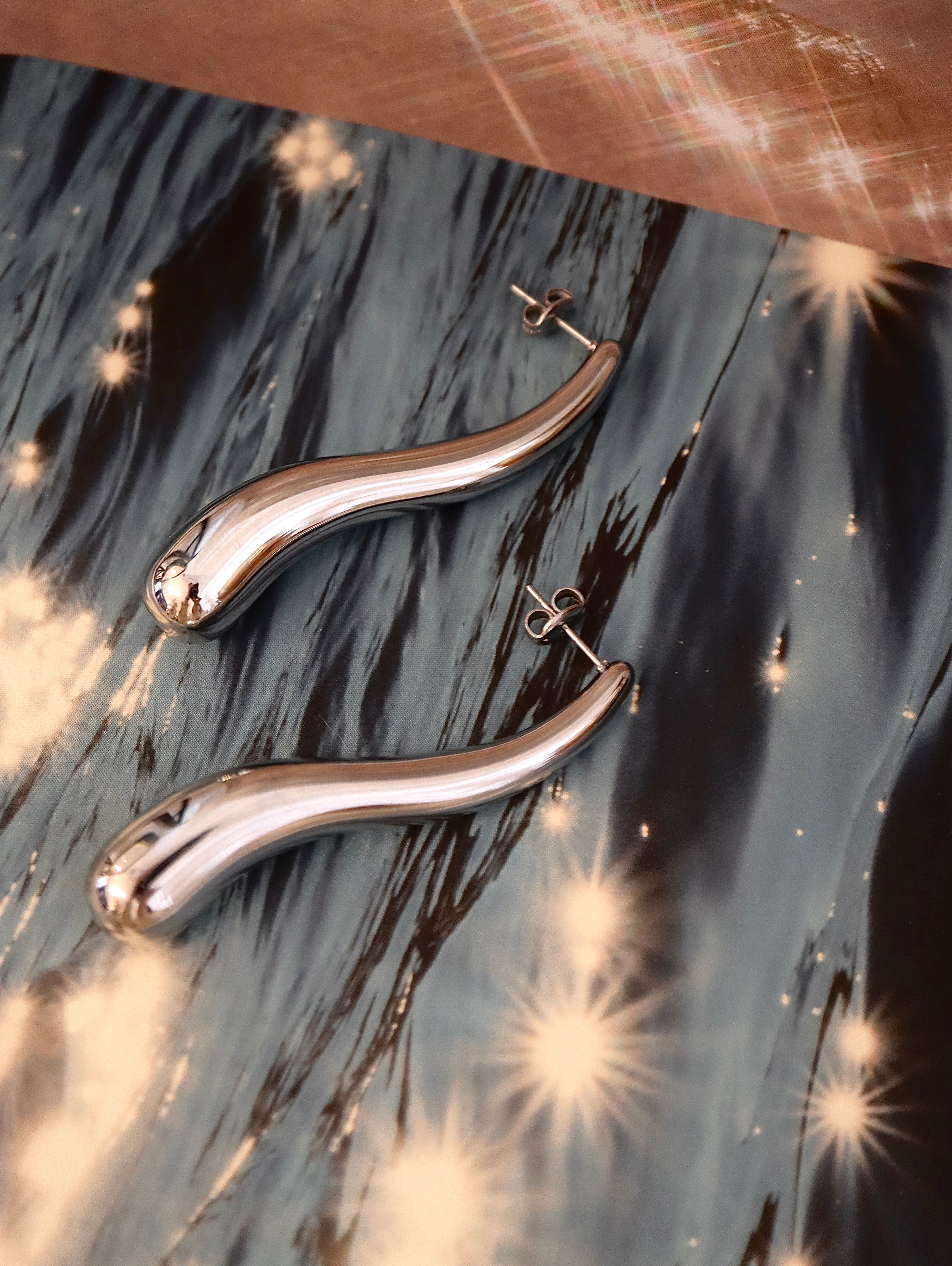 Wavy long drop stainless steel earrings