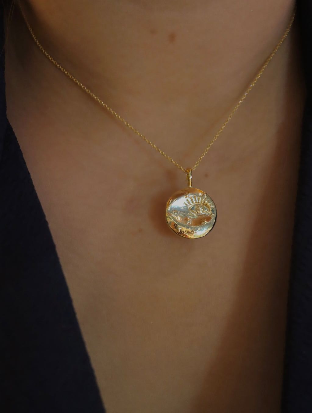Eye coin brass necklace