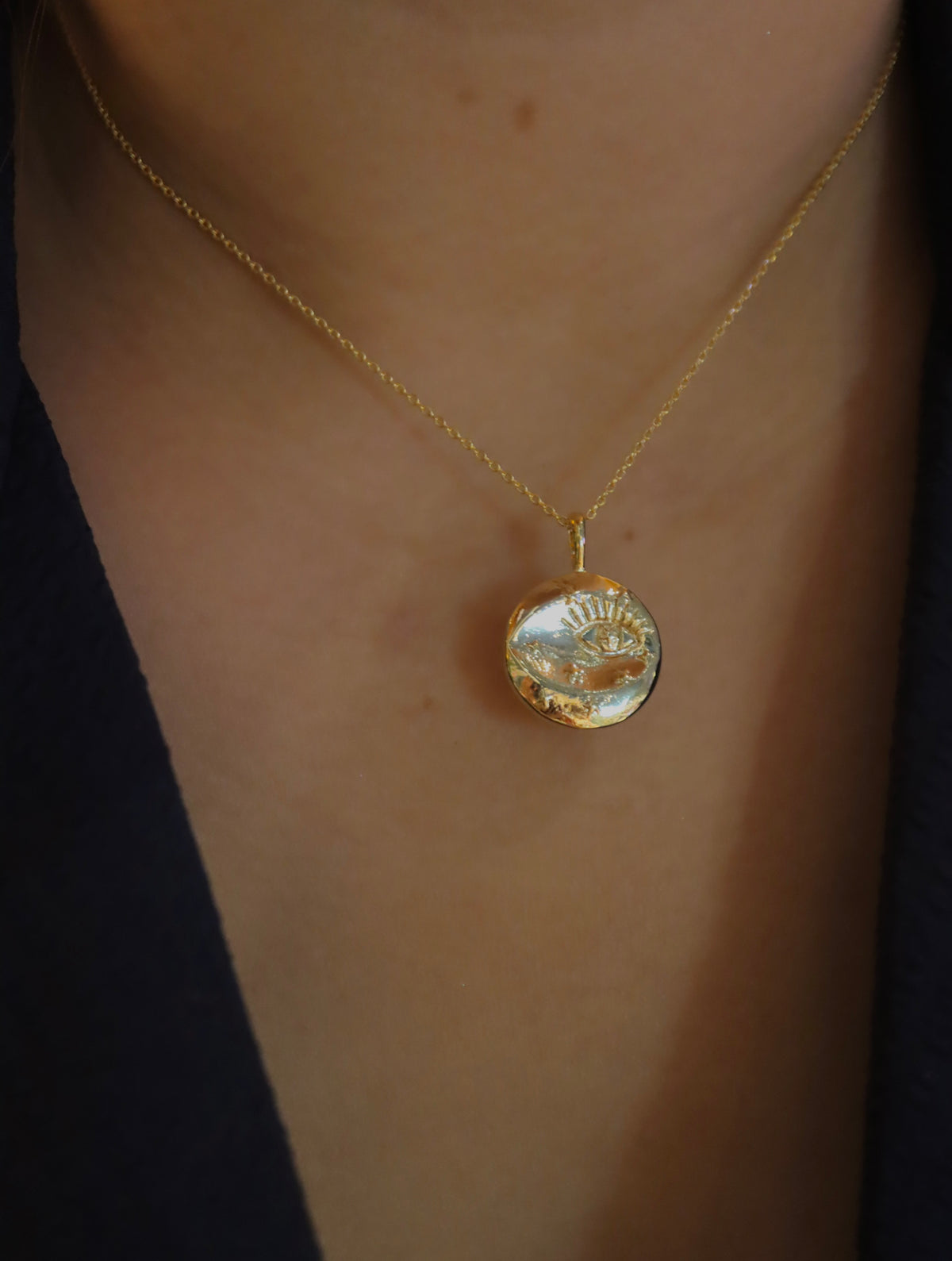 Eye coin brass necklace