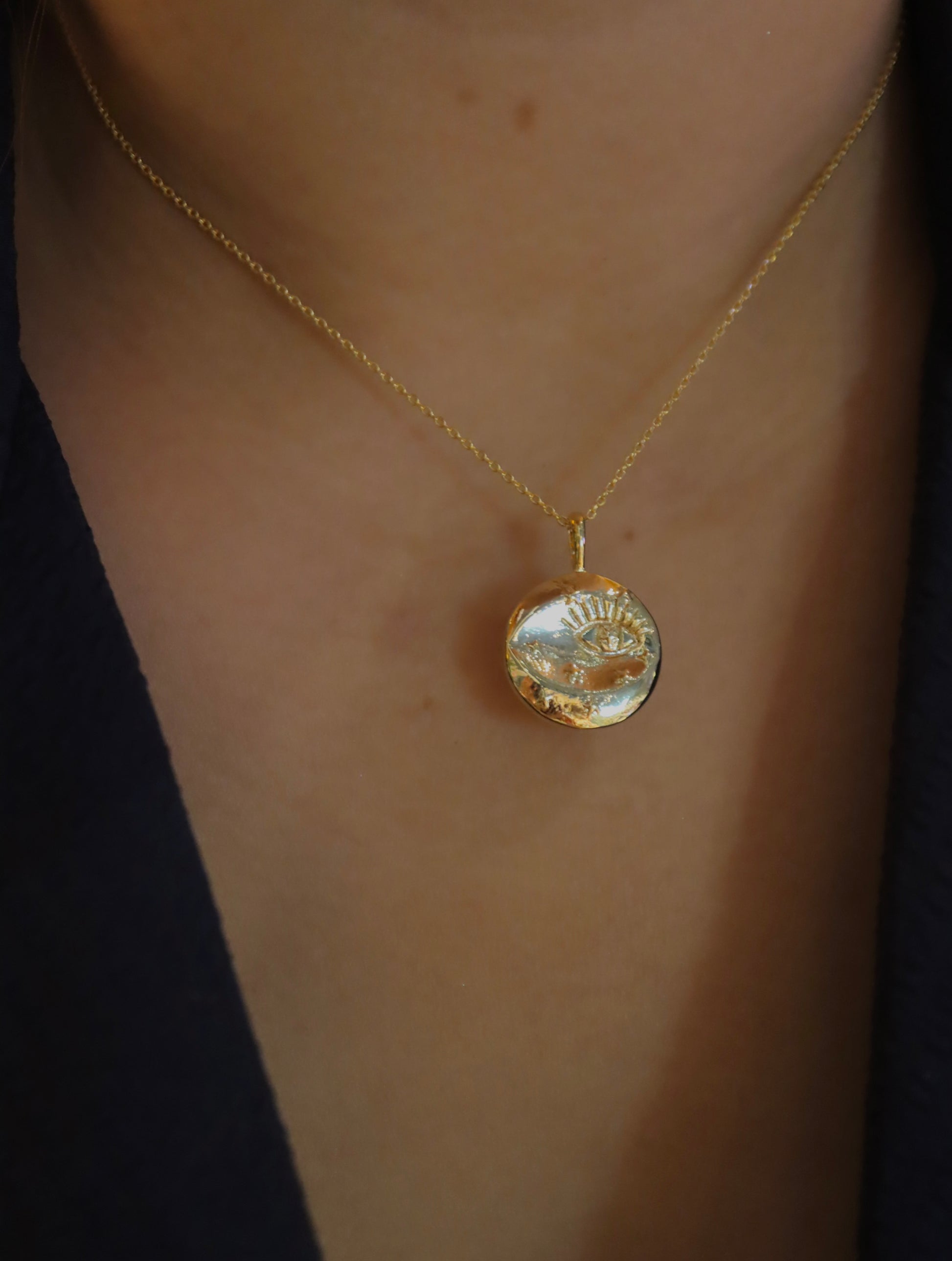 Eye coin brass necklace