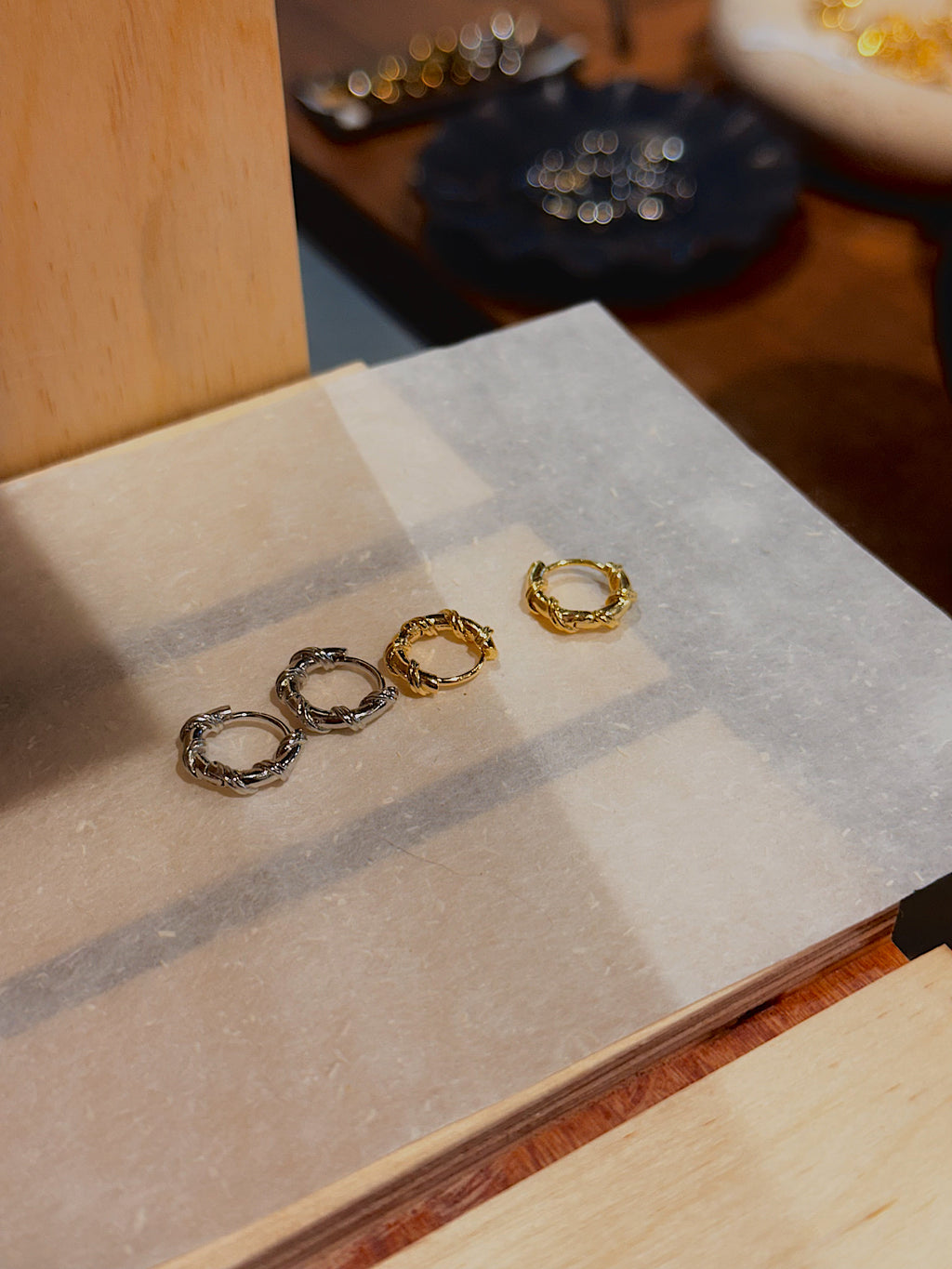Hinged hoop rope earrings