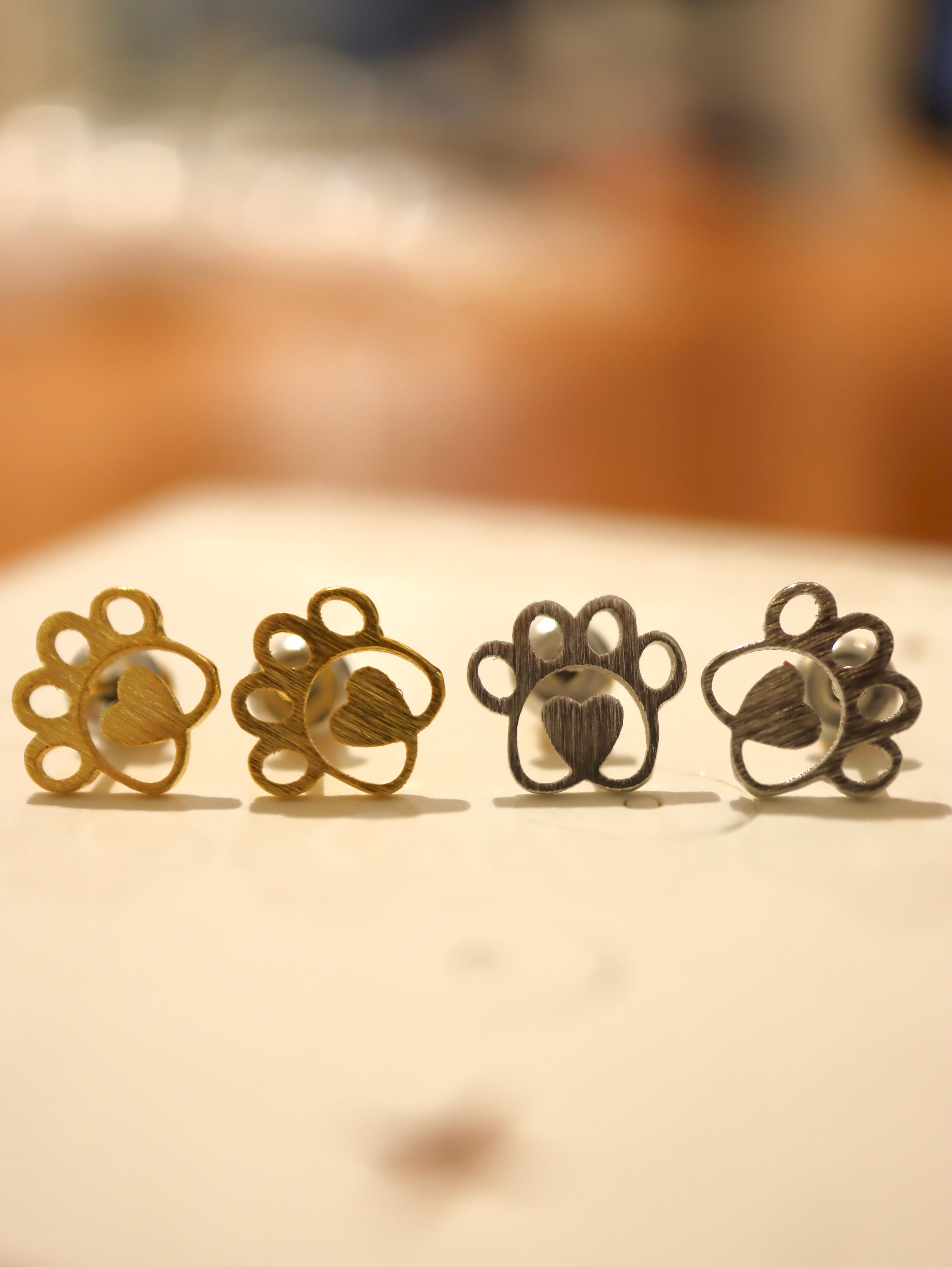Heart center paws earrings