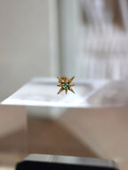 Starburst green stud piercing (1pc)