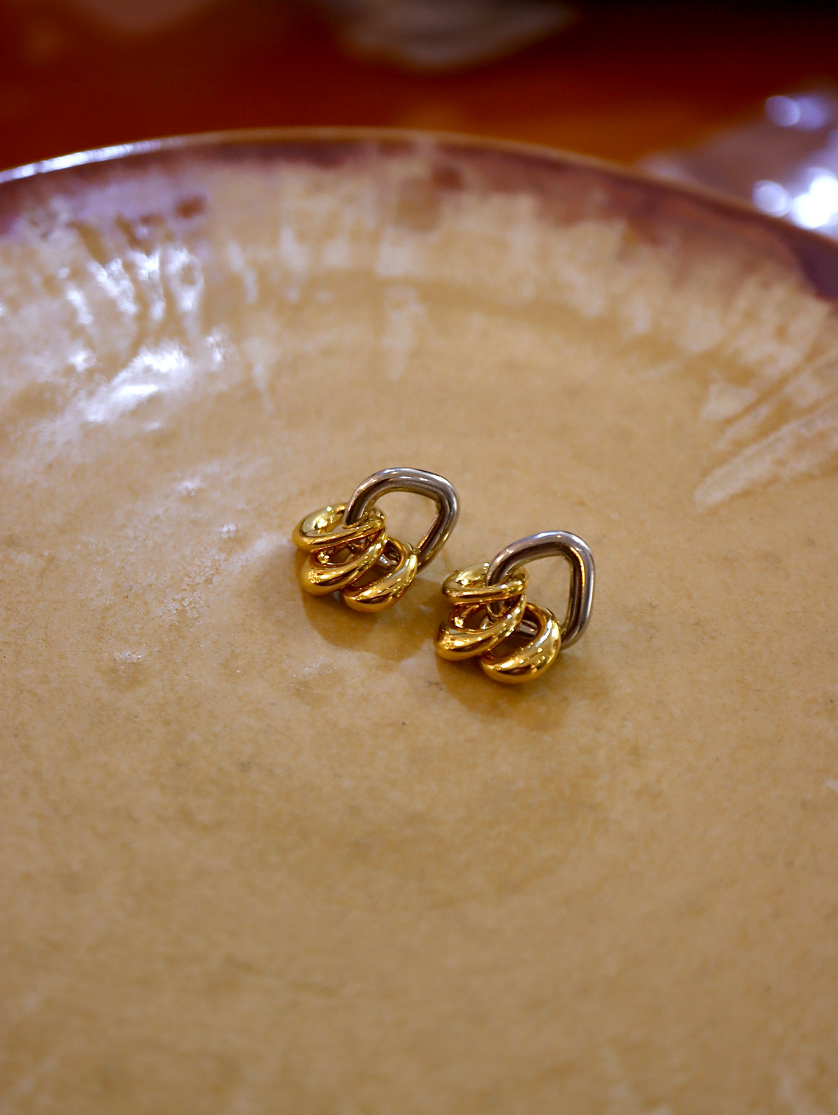 Mix tone interlock earrings