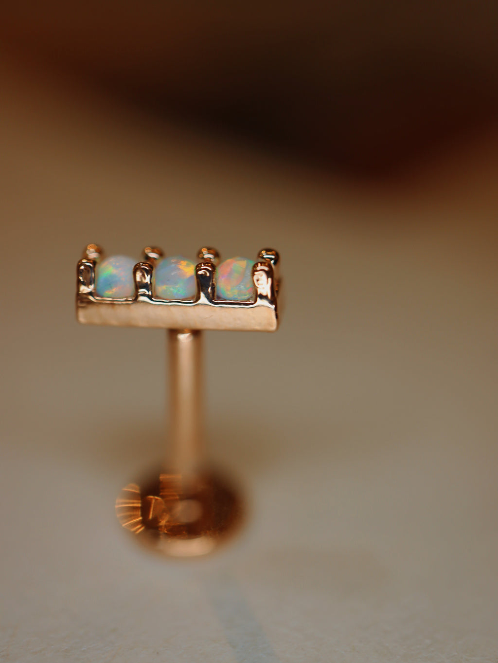 Triple opal flat back piercing