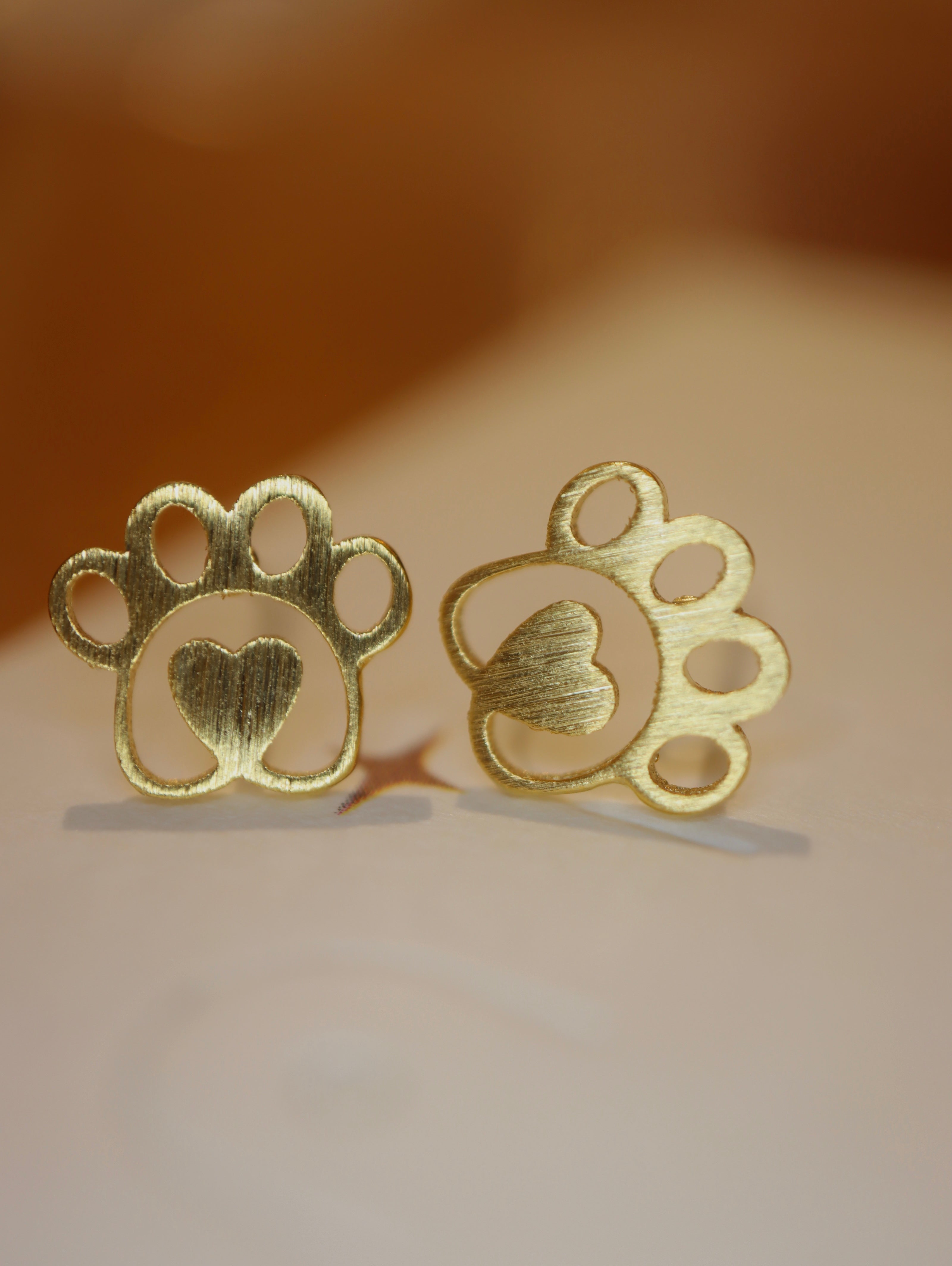 Heart center paws earrings