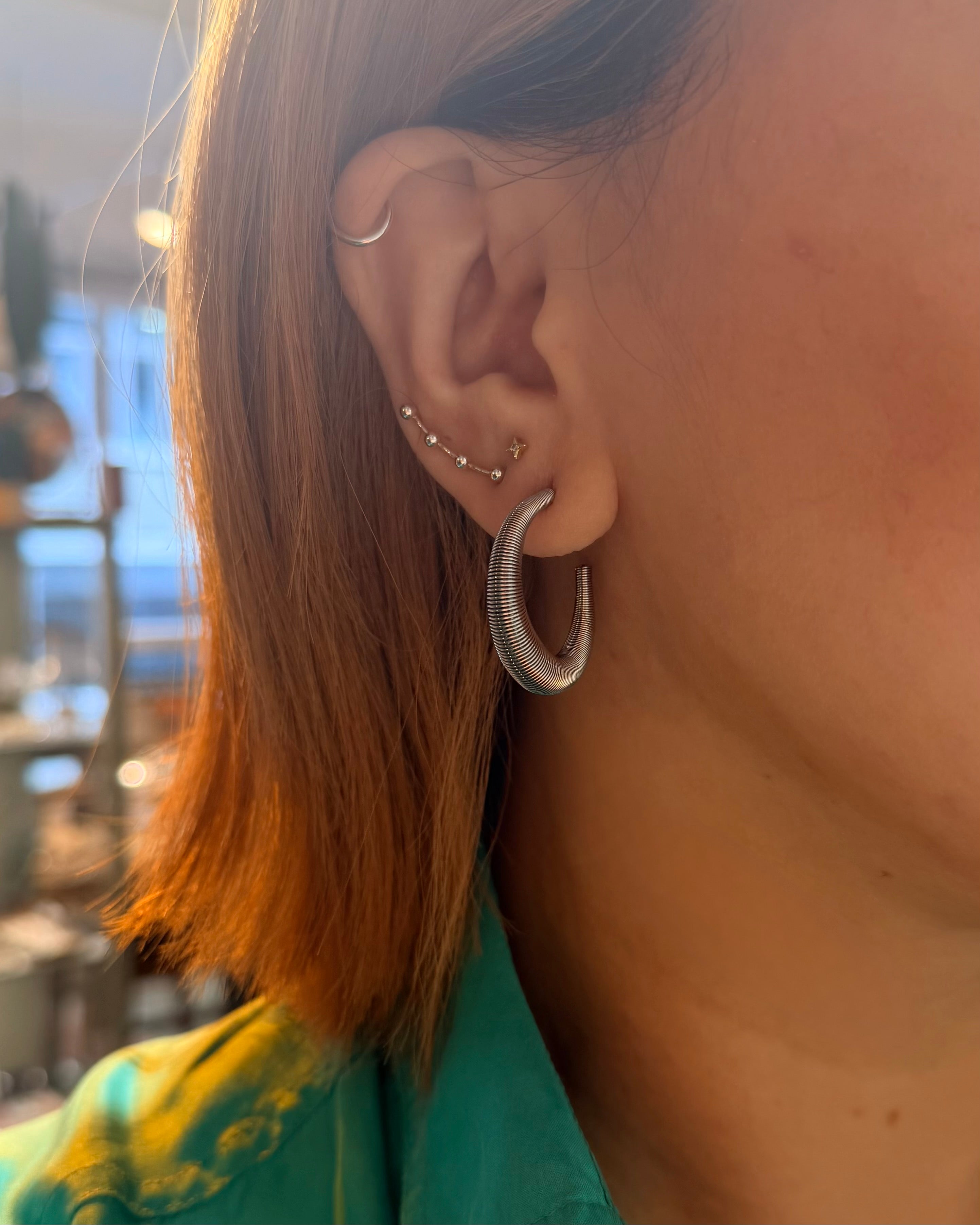 Coil steel hoop earrings