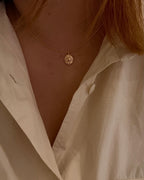 Oval sun ray brass necklace