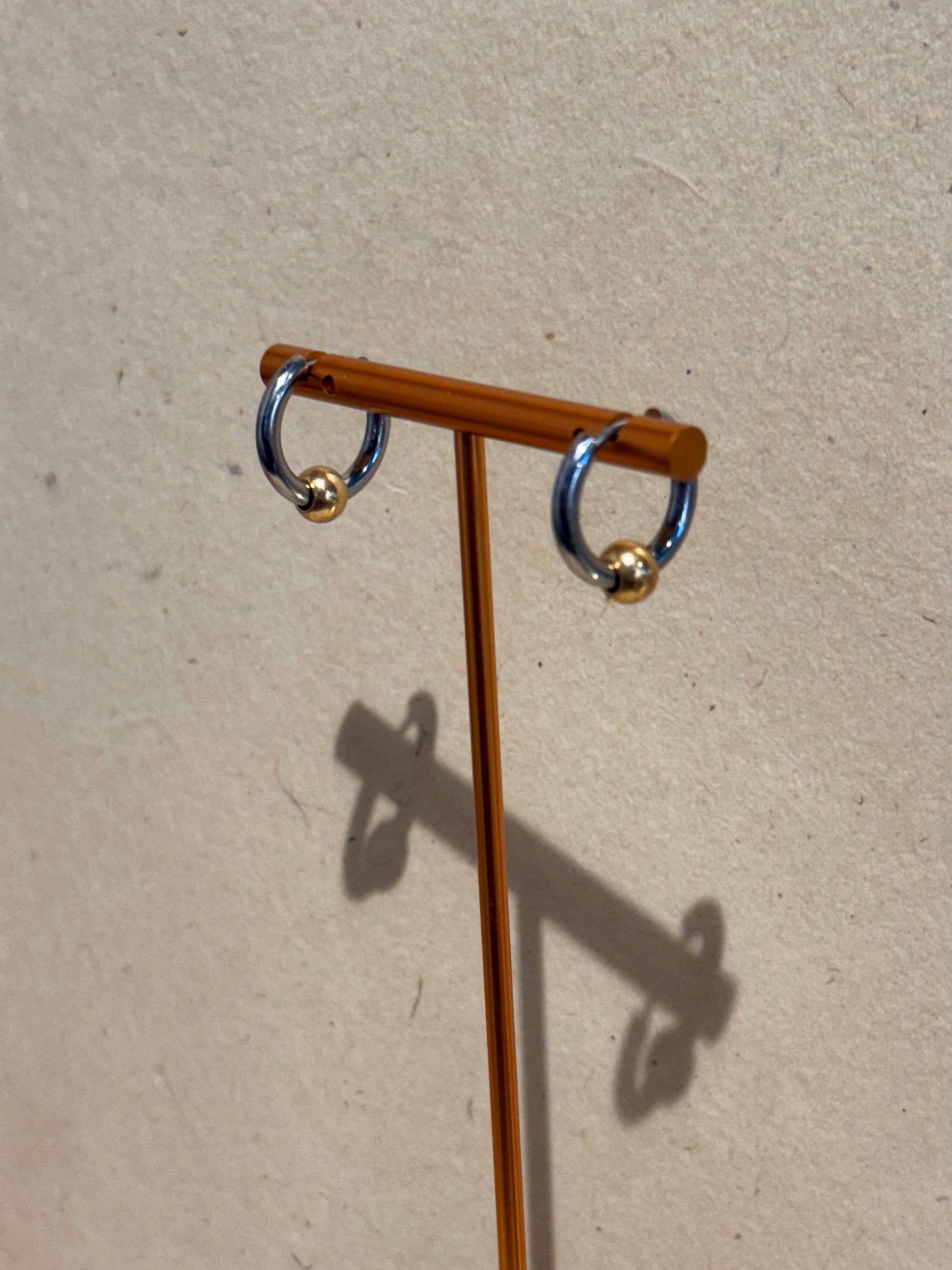 Mix tone ball hoop surgical steel earrings