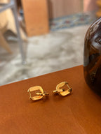 Interlock brass earrings
