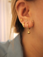 Solis textured hoop brass earrings